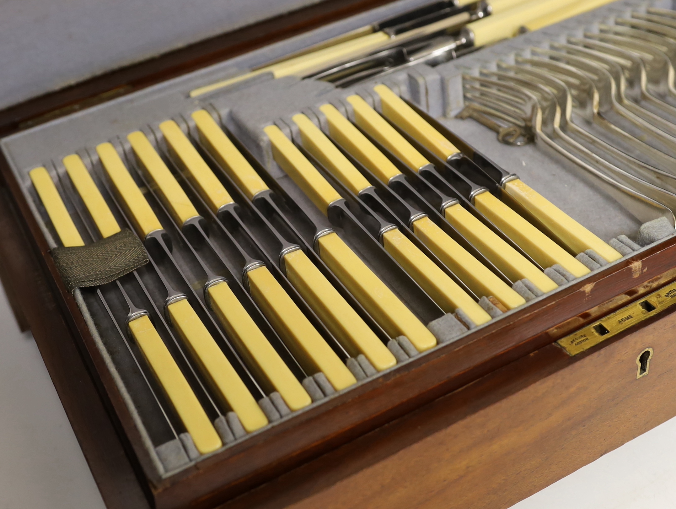 A Southern & Richardson silver plated canteen of flatware, with key